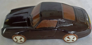 a picture of a dark chocolate Porsche