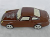 a picture of a milk chocolate porsche car