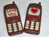 a picture of two valentine mobile phones